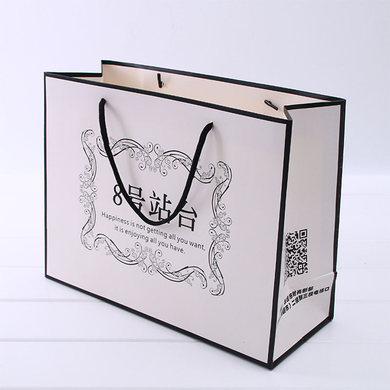 Logo privé personnalisé imprimé noir gros coussinet de shopping de luxe personnalisé cadeau sacs en papier premium avec poignée