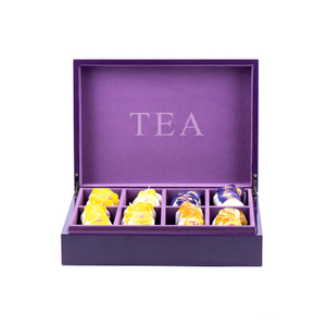 sachets de thé violets boîte à thé canonique en bois