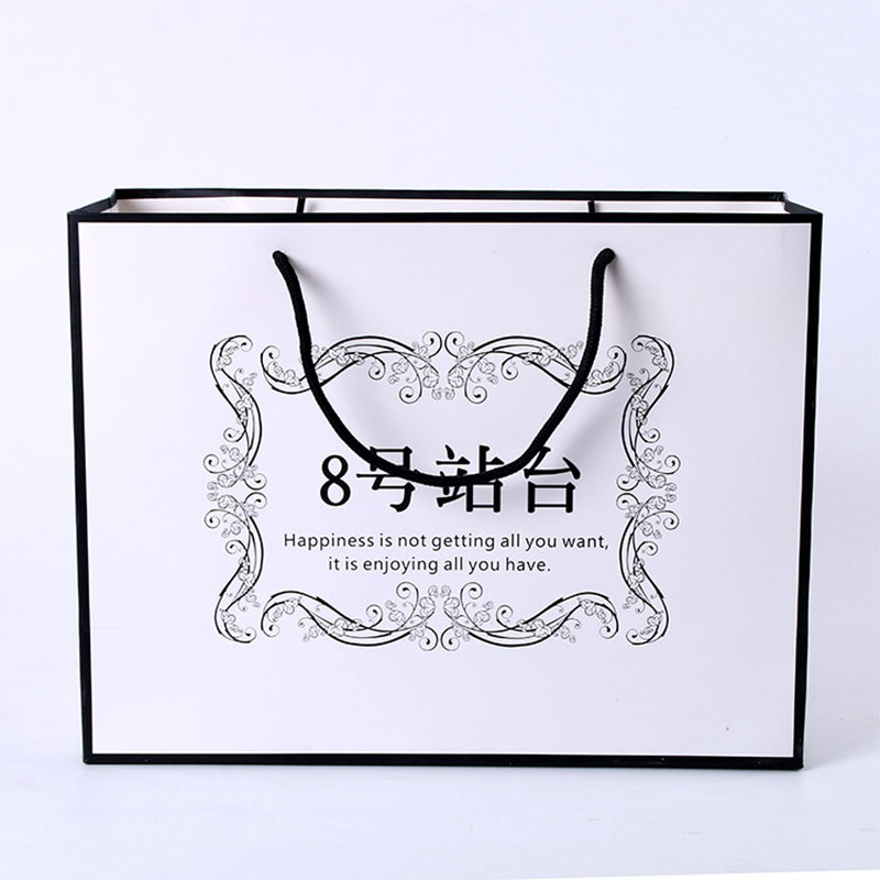 Logo privé personnalisé imprimé noir gros coussinet de shopping de luxe personnalisé cadeau sacs en papier premium avec poignée